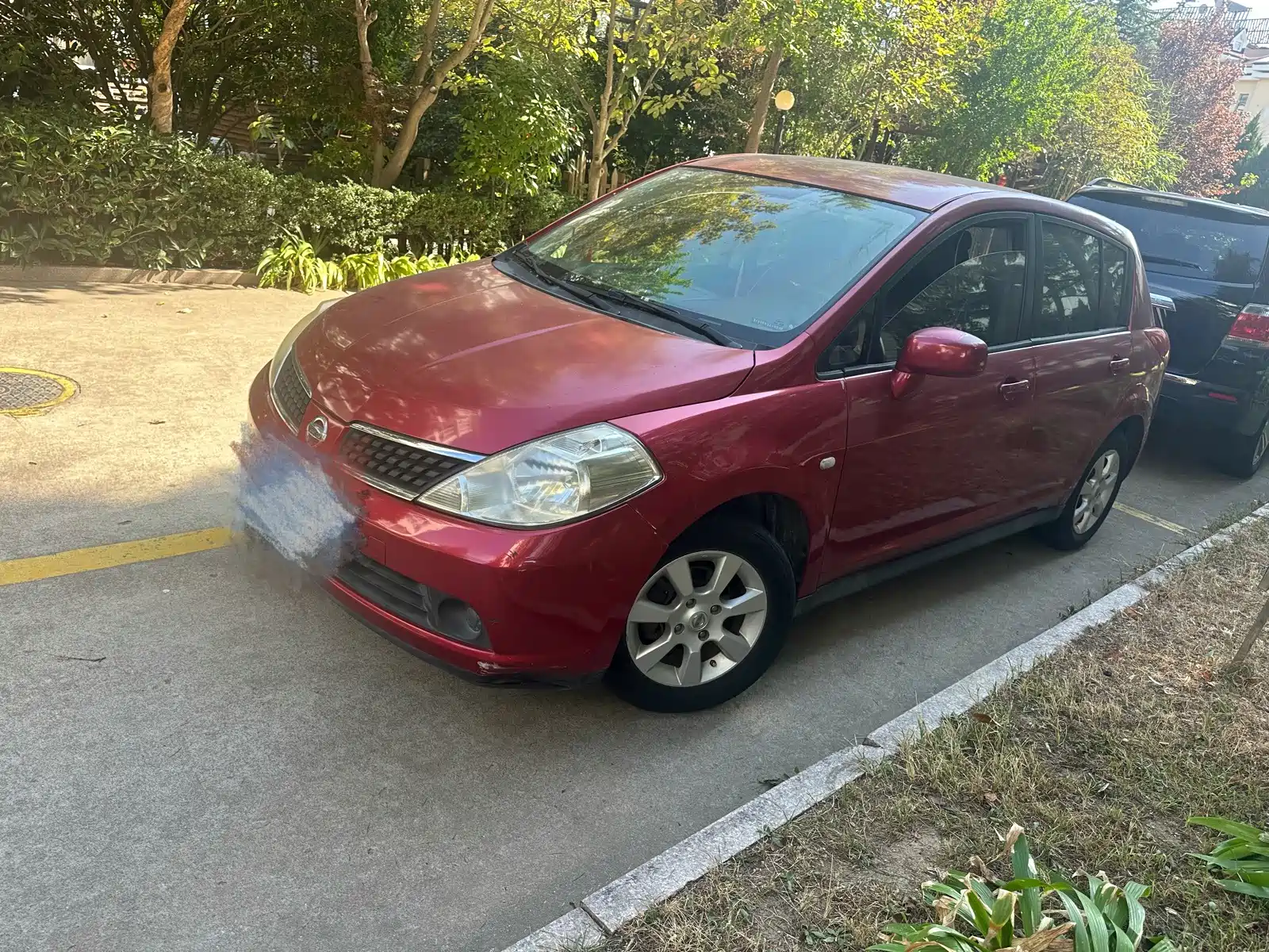 Photo 1 - Nissan Tiida
