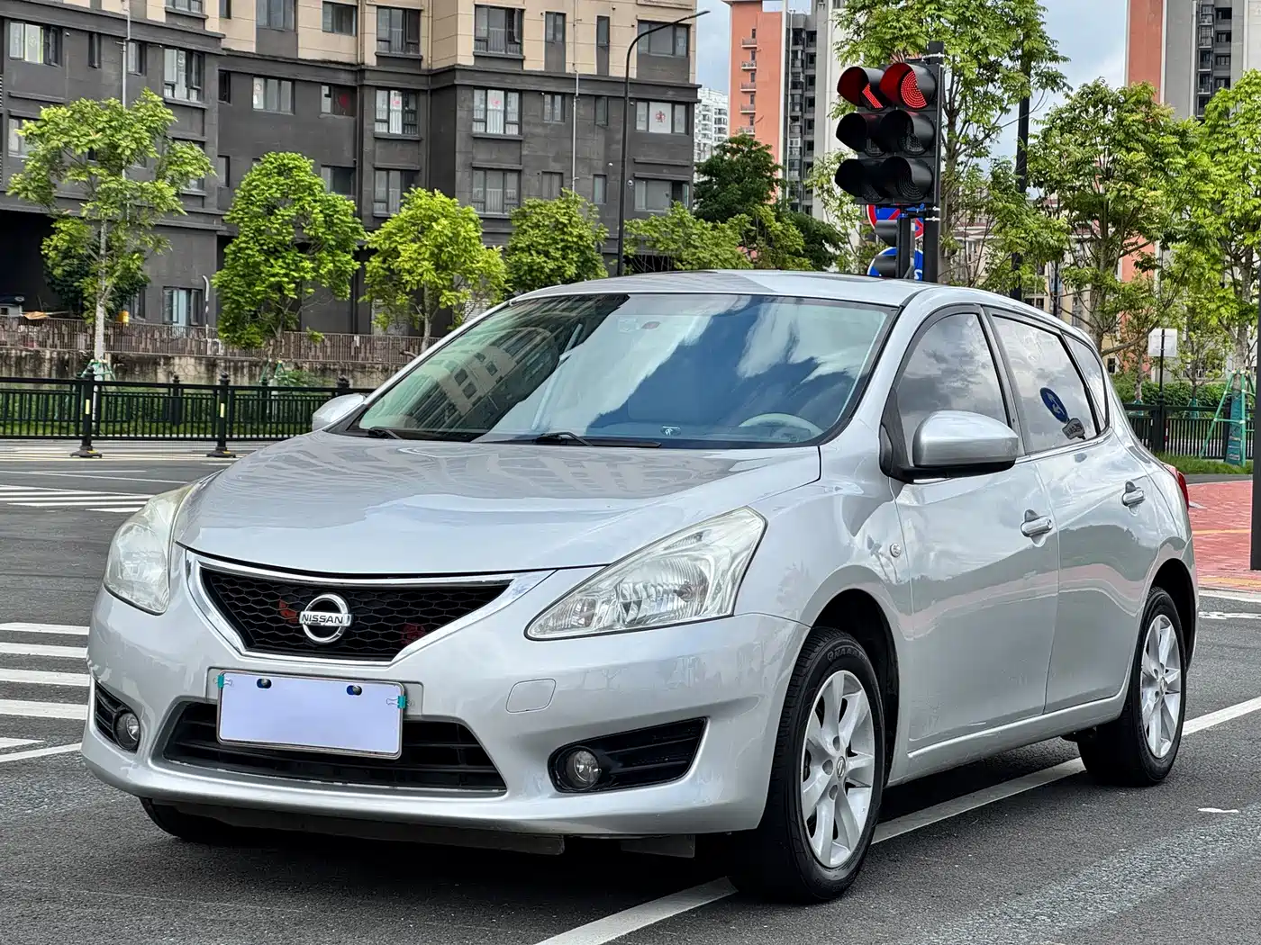Фото 1 - Nissan Tiida