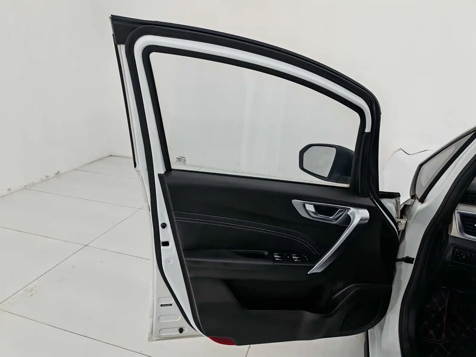 Фото 13 - Geely Vision X3