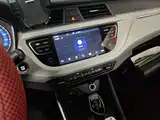 Фото 13 - Geely Vision X3