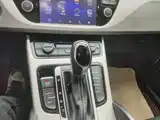 Фото 14 - Geely Atlas