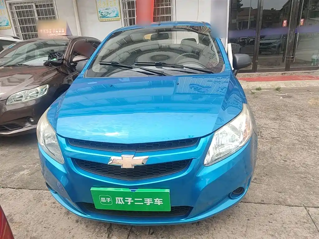 Chevrolet Sail 2013 Sedan 1.2L Manual Fashion Happiness Edition фото 3
