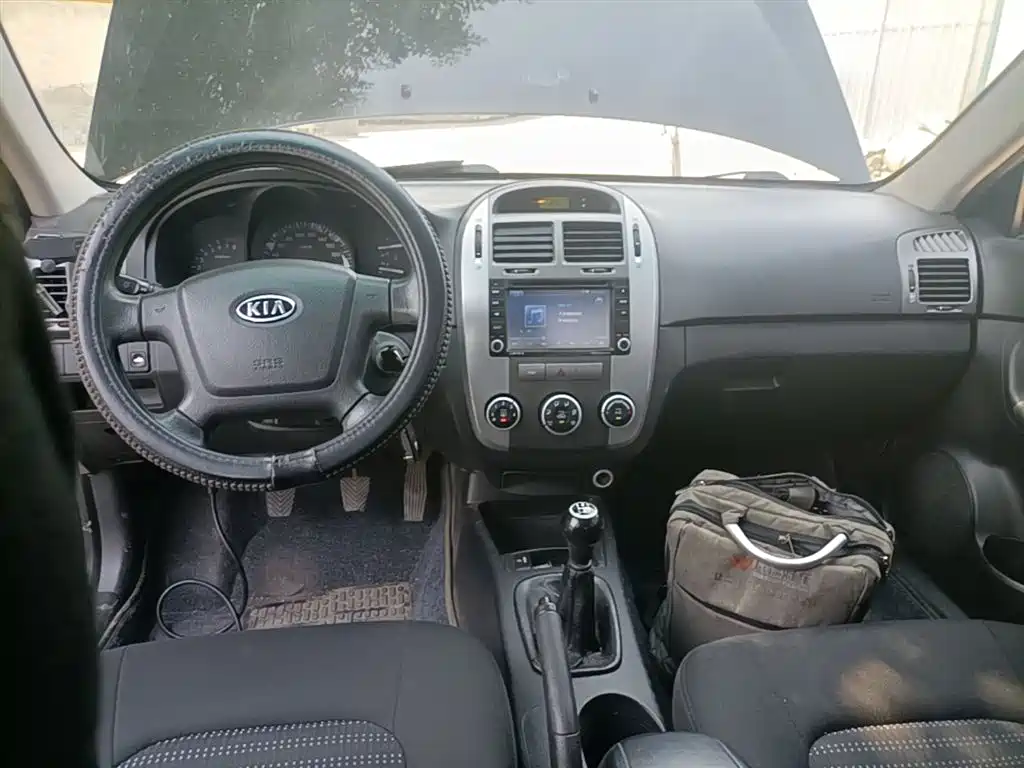 Kia Cerato 2012 1.6L MT GL фото 10