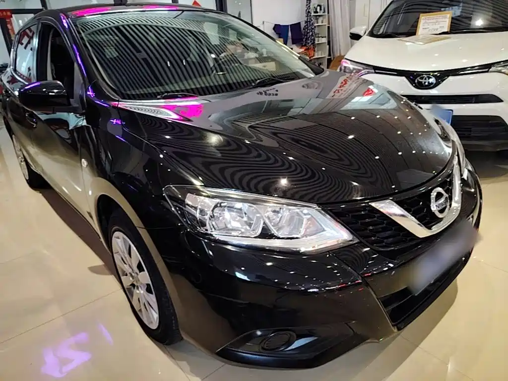 Фото 4 - Nissan Tiida