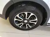 Фото 23 - Geely Vision X3