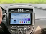 Фото 36 - Nissan Tiida
