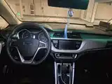 Фото 13 - Geely Vision X3