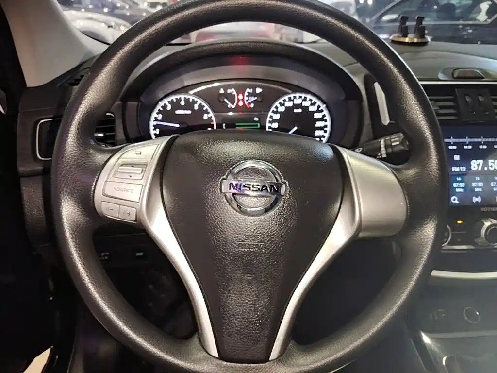 Фото 11 - Nissan Tiida