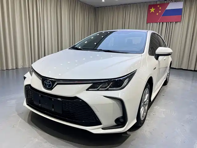 Toyota Corolla 1.8L, интеллектуальный гибрид, два мотора, Элит
