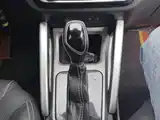 Фото 14 - Geely Vision X3