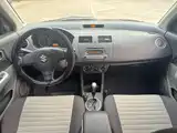Фото 9 - Suzuki Swift