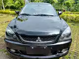 Фото 33 - Mitsubishi Lancer