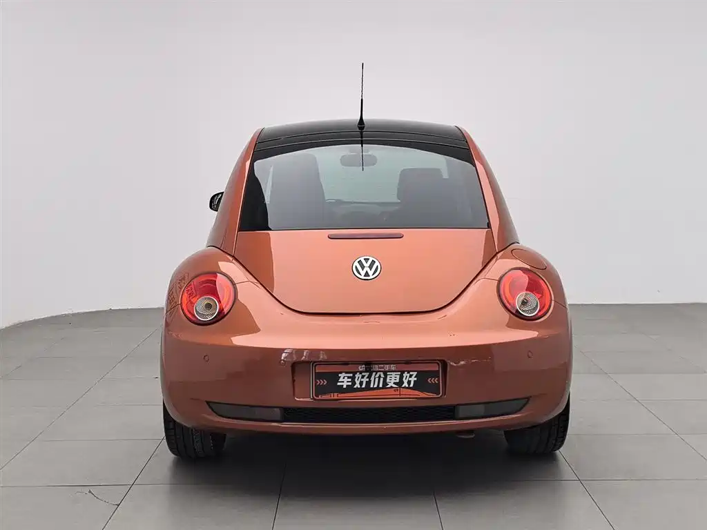 Volkswagen Beetle 2010 1.8T BlackOrange Luxury Edition фото 4