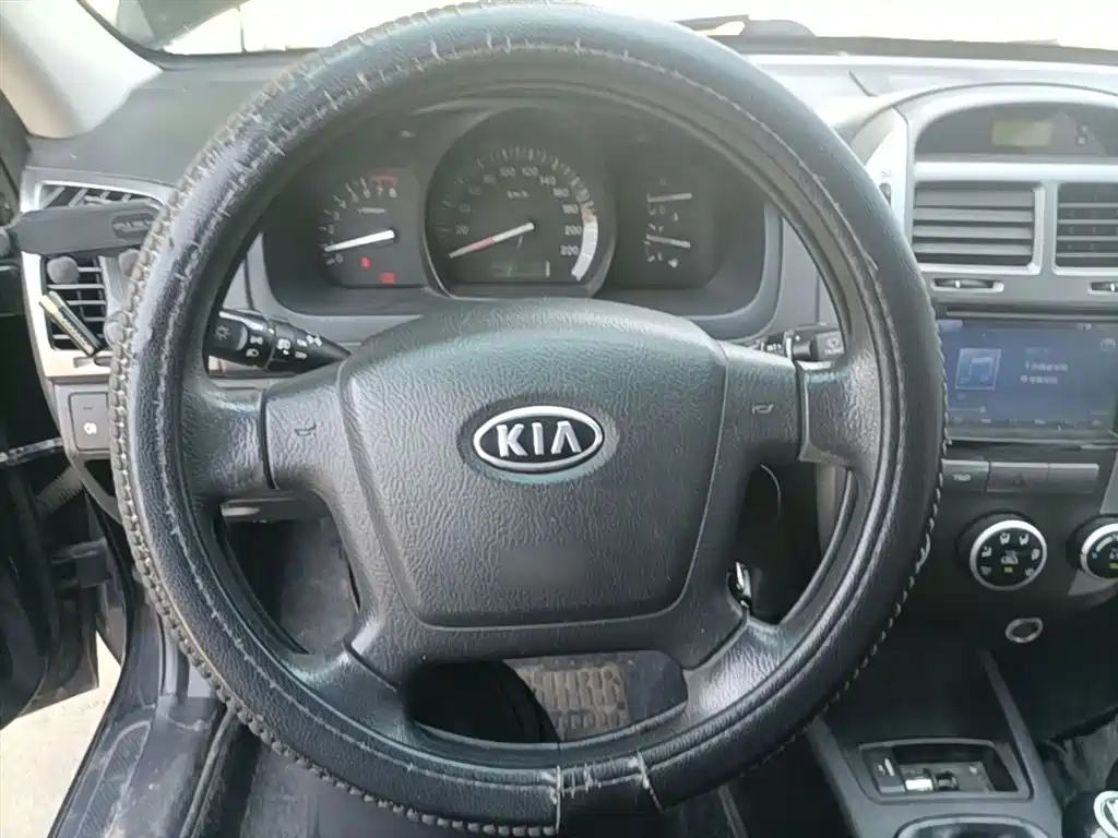 Kia Cerato 2012 1.6L MT GL фото 11