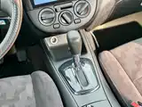 Фото 35 - Nissan Tiida