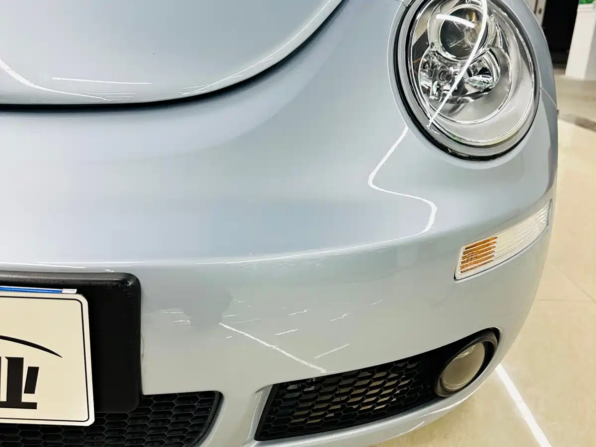 Volkswagen Beetle 2010 1.8T BlackOrange Luxury Edition фото 9