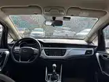 Фото 5 - Geely Vision X3