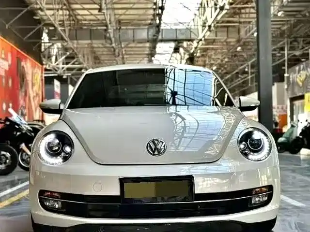 Volkswagen Beetle 2014 1.2TSI Comfort Edition фото 2