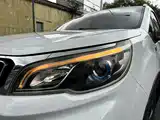 Фото 16 - Geely Vision X3
