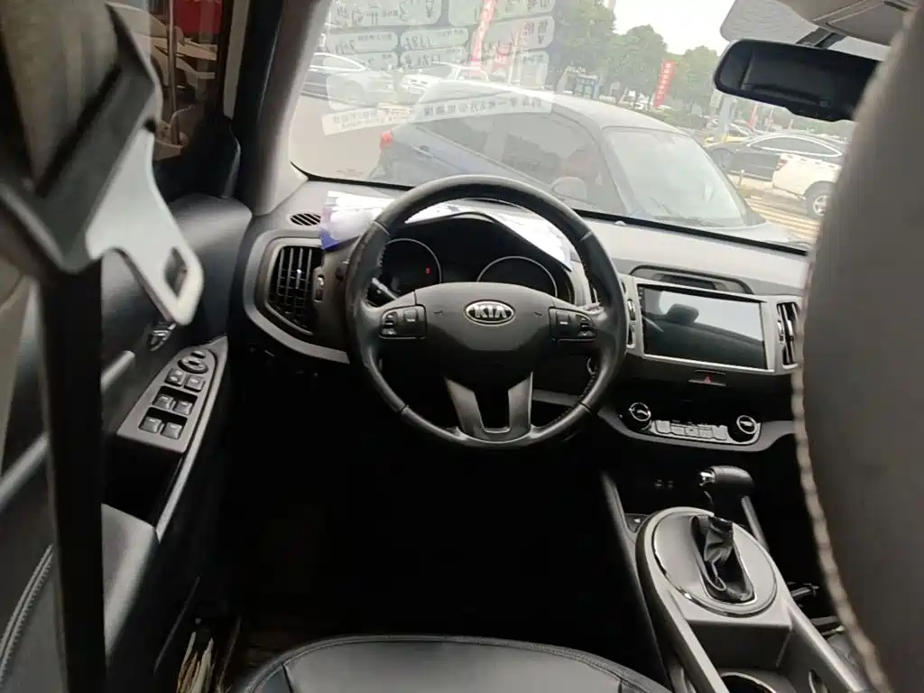 Фото 11 - Kia Sportage