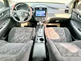 Фото 31 - Nissan Tiida