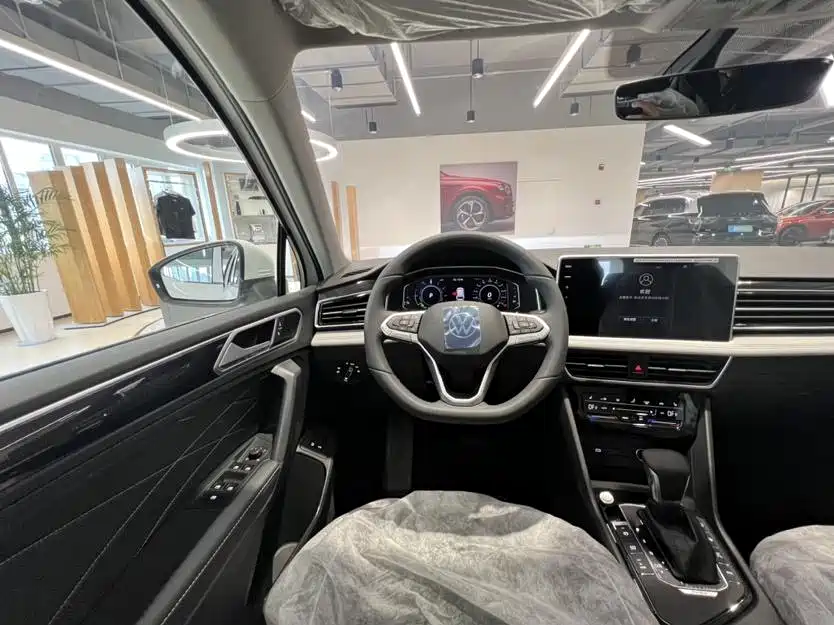 Volkswagen Tiguan L PHEV 2023 430PHEV Plug-in Hybrid Premium фото 12