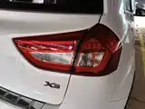 Фото 8 - Geely Vision X3
