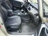 Фото 13 - Geely Vision X3
