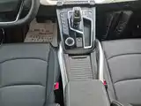 Фото 14 - Geely Atlas