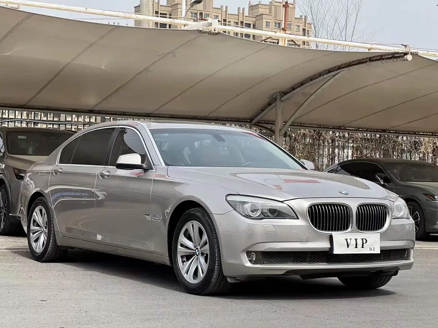 BMW 7 Series 2009 730Li Leading фото 3