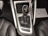 Фото 14 - Geely Vision X3
