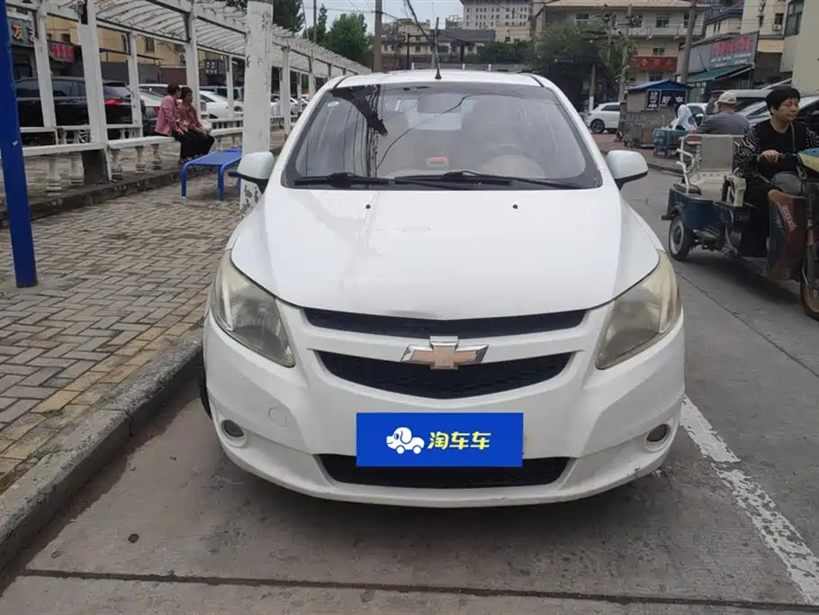 Chevrolet Sail 2011 Hatchback 1.4L Manual Happiness Edition фото 2