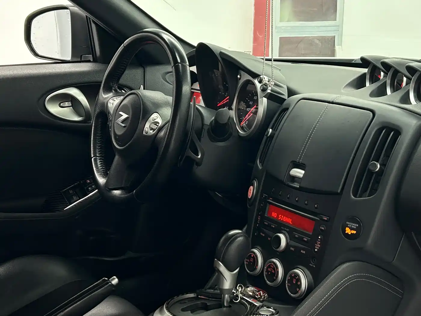 Nissan 370Z 2013 3.7L Coupe фото 16