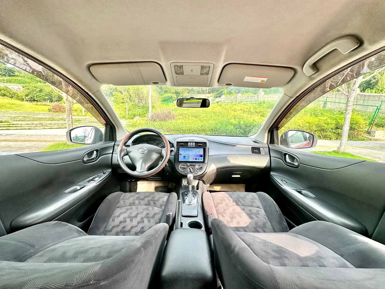 Фото 32 - Nissan Tiida