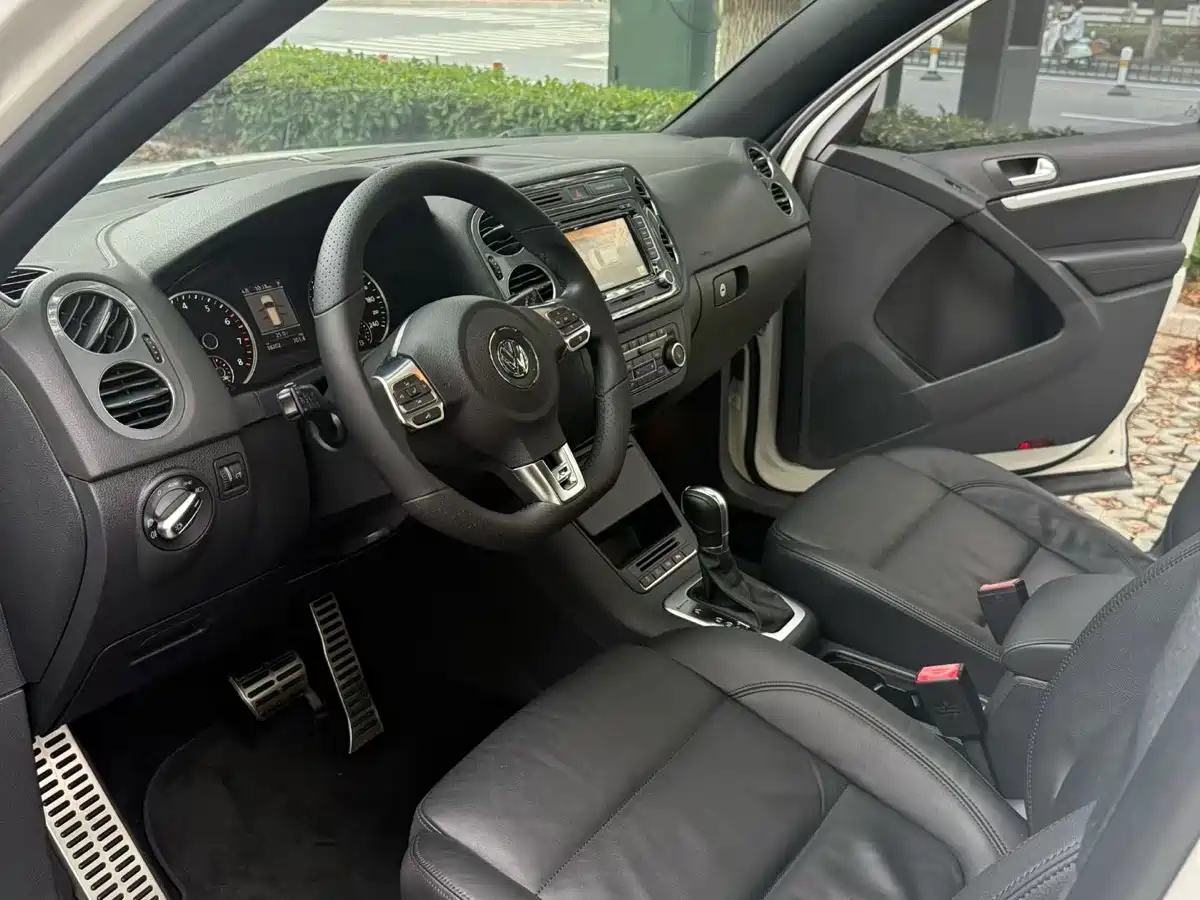 Volkswagen Tiguan 2014 2.0TSI Exclusive Edition фото 2