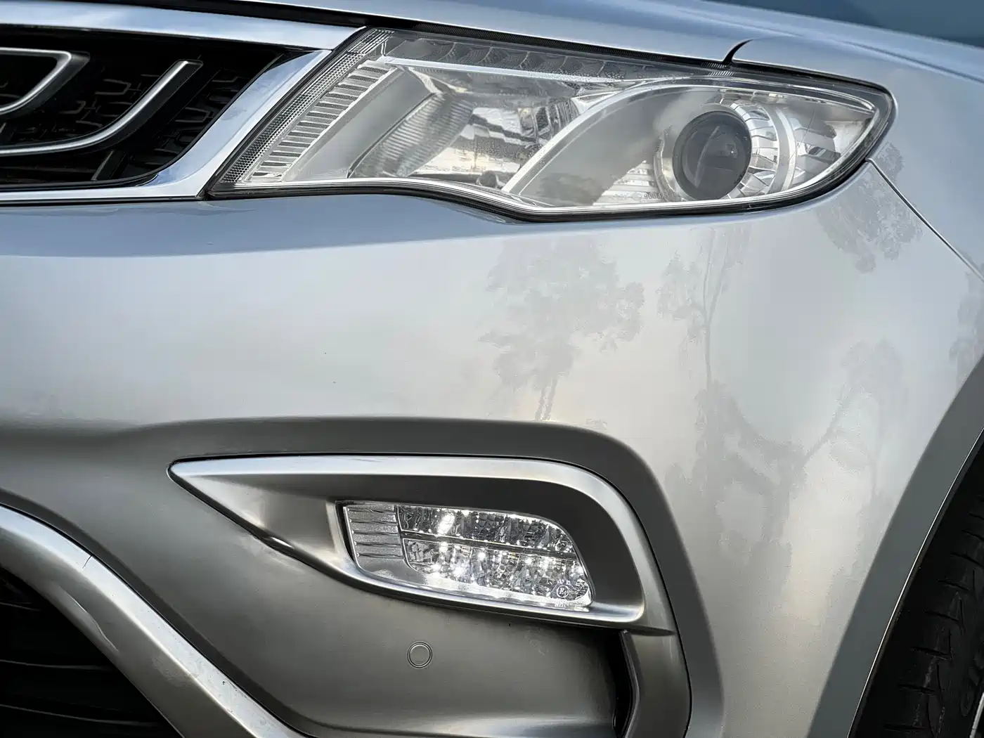 Фото 21 - Geely Atlas