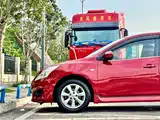 Фото 9 - Nissan Tiida