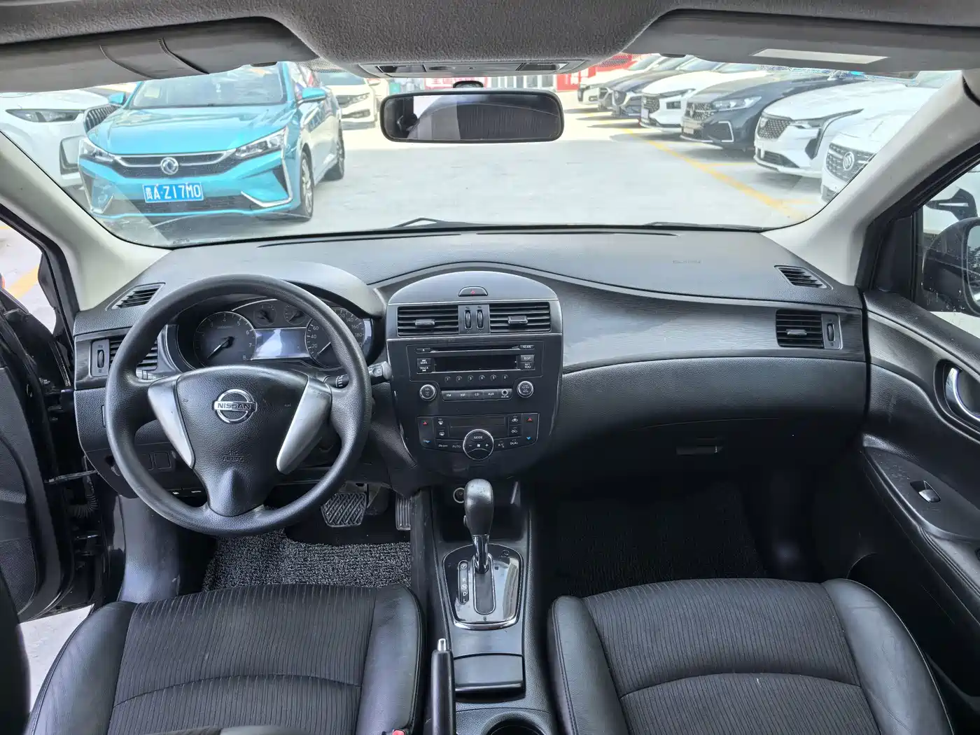 Фото 11 - Nissan Tiida