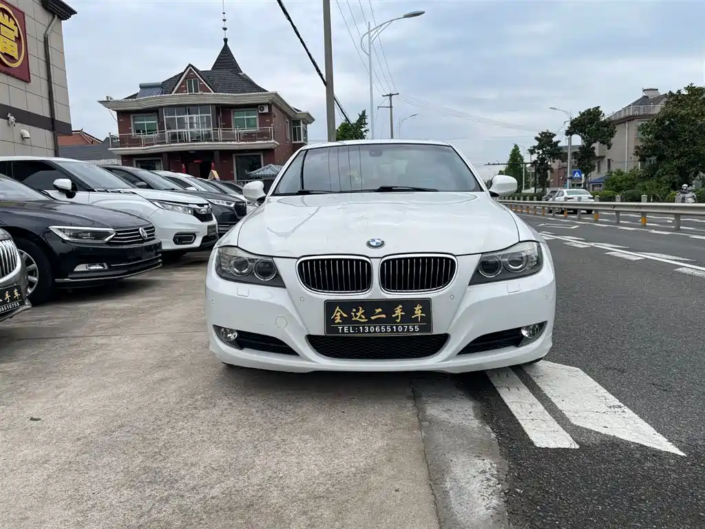 BMW 3 Series (Import) 2010 325i Luxury фото 2