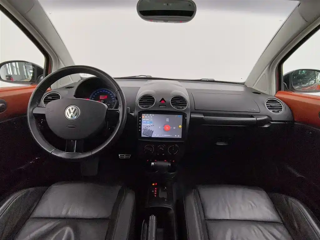 Volkswagen Beetle 2010 1.8T BlackOrange Luxury Edition фото 5