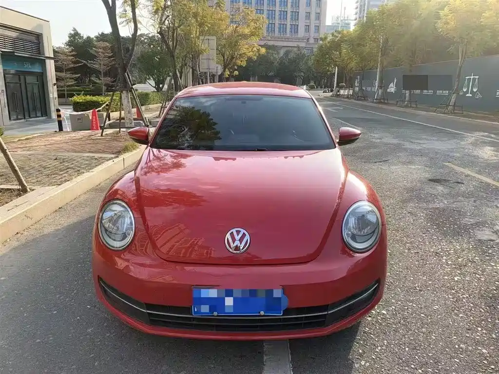 Volkswagen Beetle 2013 1.2TSI Fashion фото 2