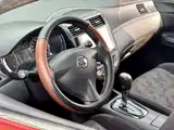 Фото 19 - Nissan Tiida