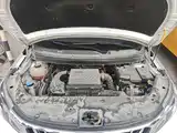 Фото 20 - Geely Vision X3