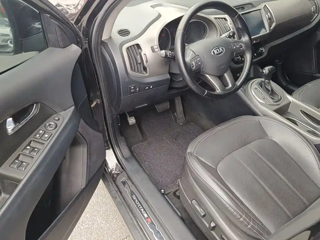 Фото 16 - Kia Sportage