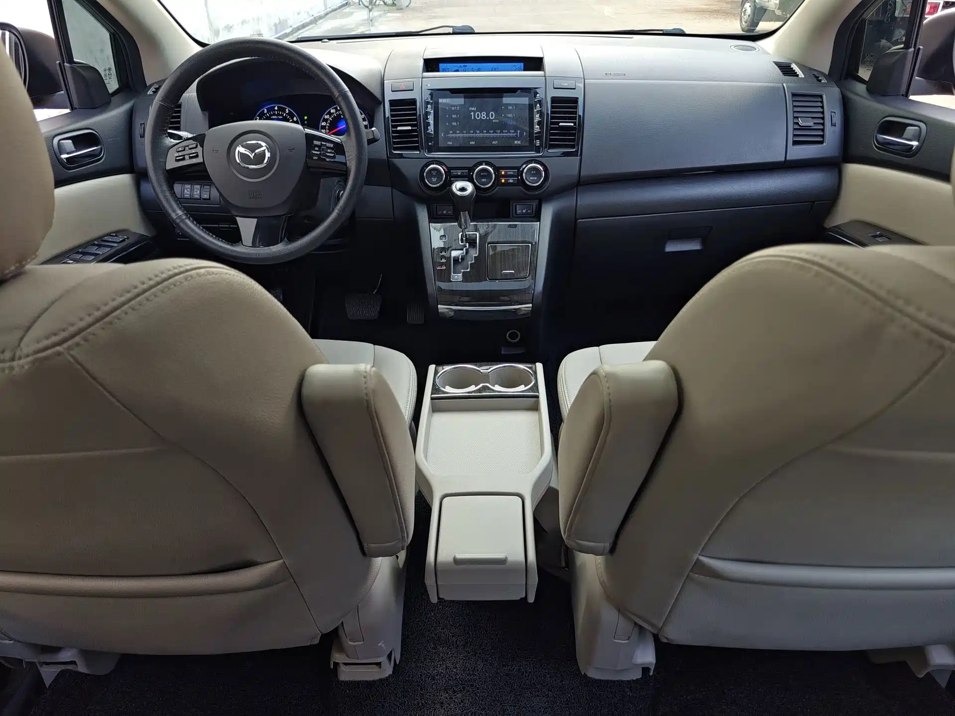 Фото 32 - Mazda 8