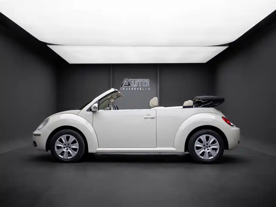 Volkswagen Beetle 2009 2.0 AT Top Convertible фото 3