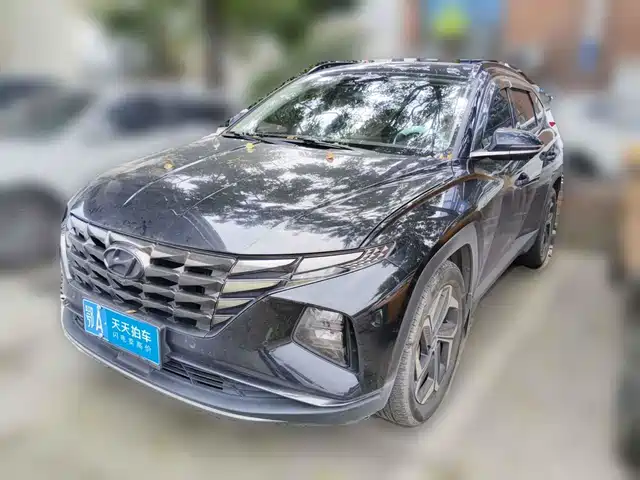 Hyundai Tucson 2021 Tucson L 1.5T DCT TOP Flagship — фото 1