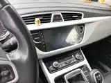 Фото 9 - Geely Atlas
