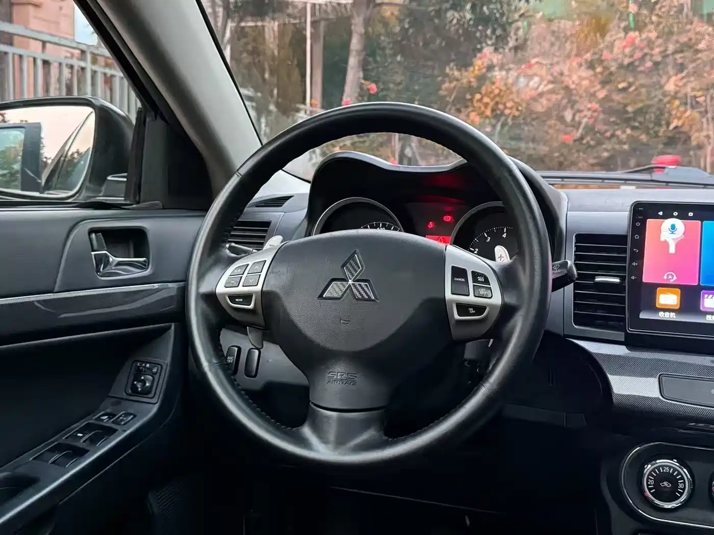 Mitsubishi Lancer EX 2013 ZhiShang Edition 1.8L CVT Luxury фото 4
