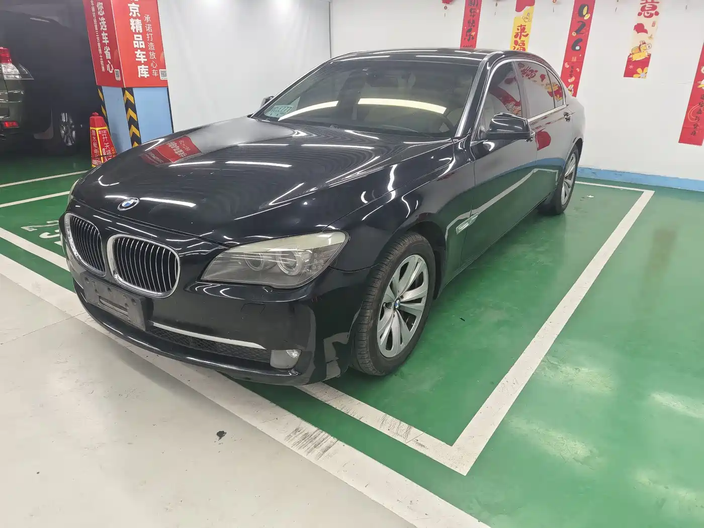 BMW 7 Series 2009 730Li Leading фото 2